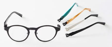 Óculos de leitura com ímãs: armação preta e 4 hastes avulsas em azul, marrom, cinza e preto, com encaixe magnético.